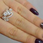 Срібна каблучка з золотими вставками