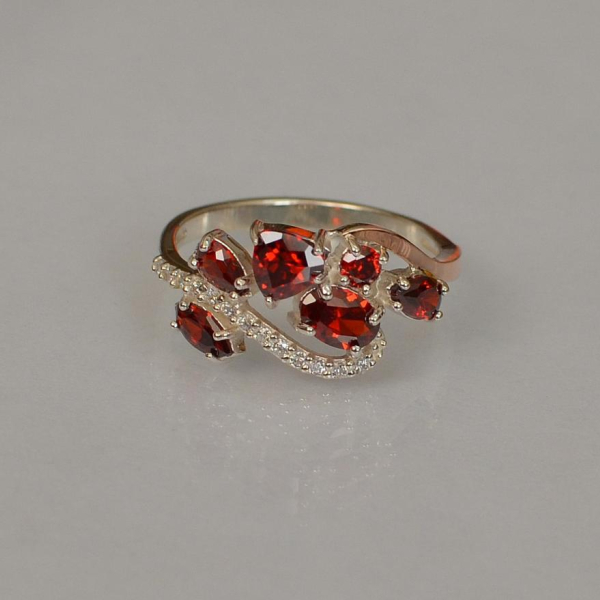 Срібна каблучка з золотими вставками