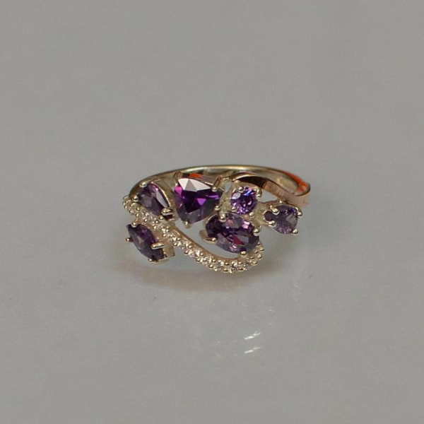 Срібна каблучка з золотими вставками