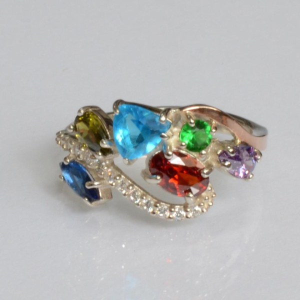 Срібна каблучка з золотими вставками