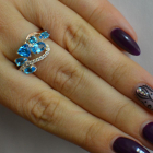 Срібна каблучка з золотими вставками