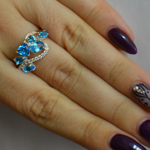 Срібна каблучка з золотими вставками