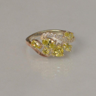 Срібна каблучка з золотими вставками