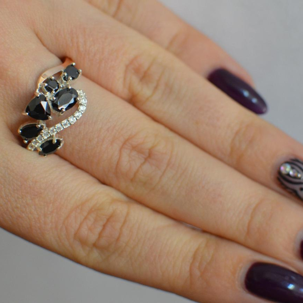 Срібна каблучка з золотими вставками