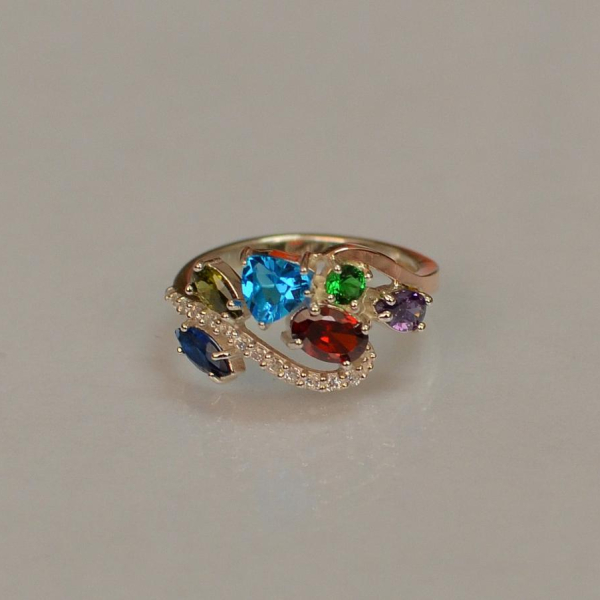 Срібна каблучка з золотими вставками