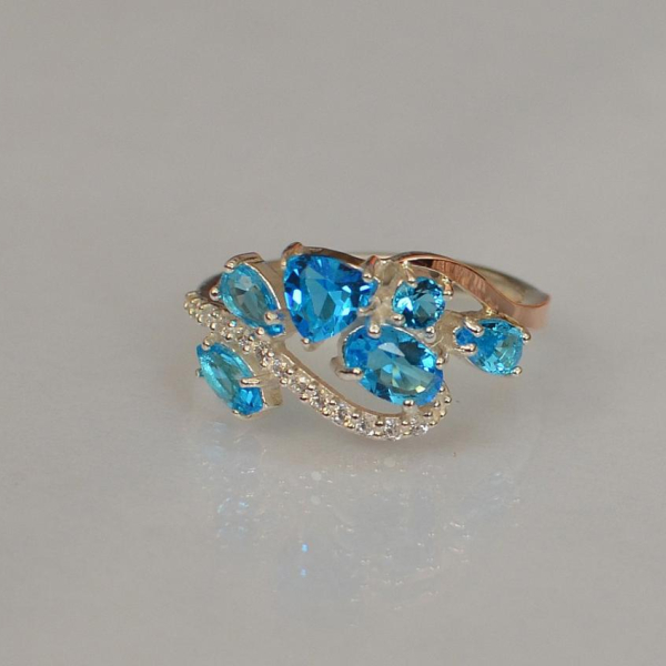 Срібна каблучка з золотими вставками