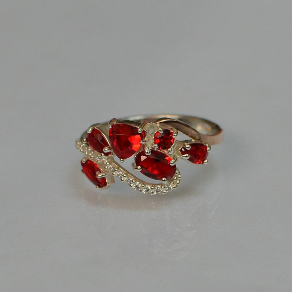 Срібна каблучка з золотими вставками