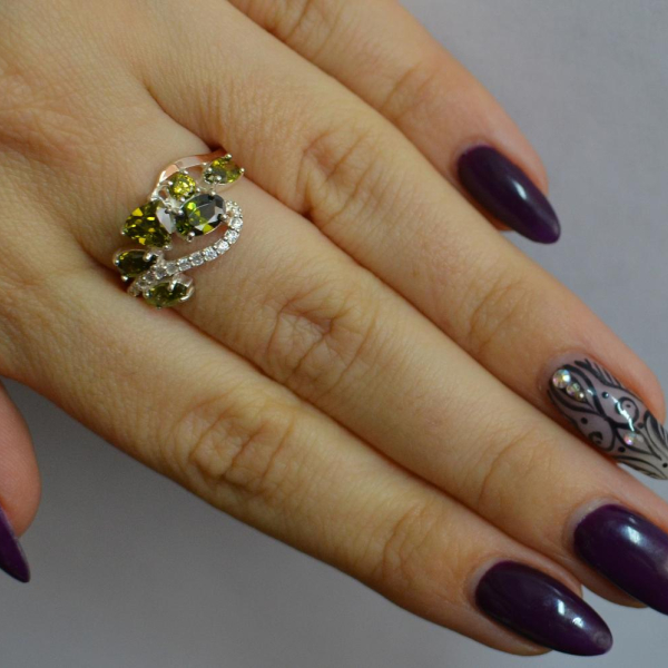 Срібна каблучка з золотими вставками