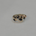 Срібна каблучка з золотими вставками