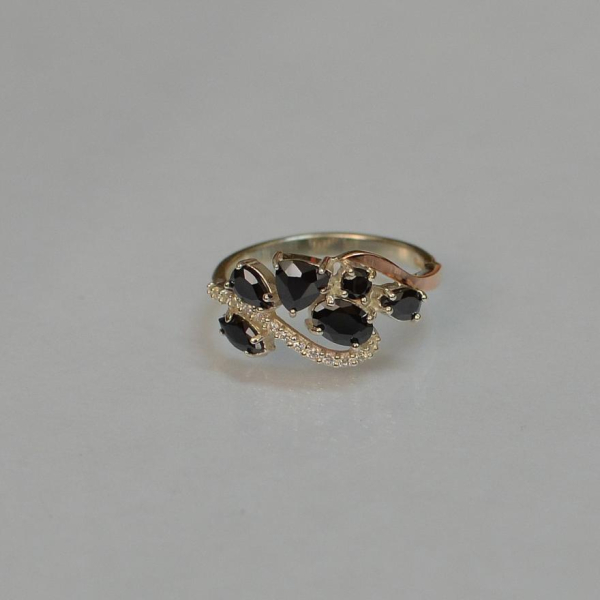 Срібна каблучка з золотими вставками