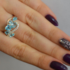 Срібна каблучка з золотими вставками