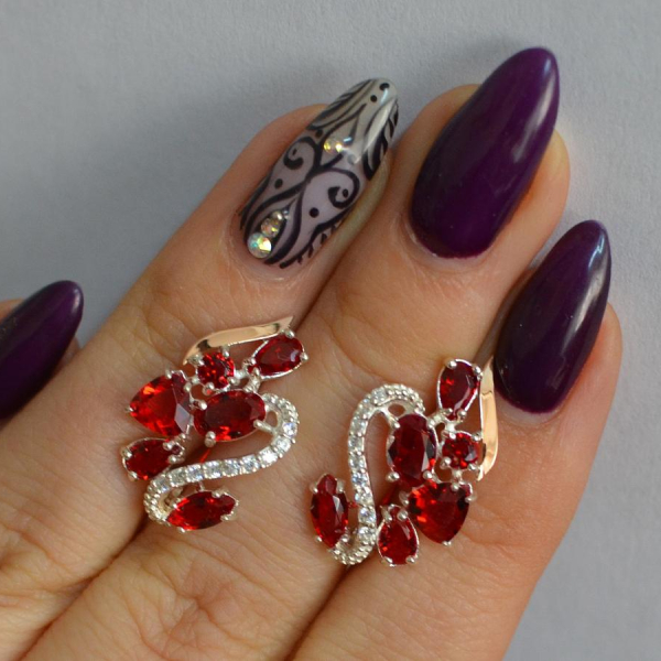 Срібні сережки з золотими пластинами