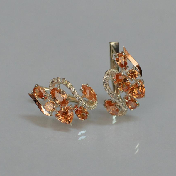 Срібні сережки з золотими пластинами