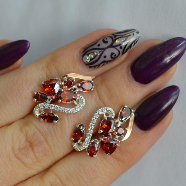 Срібні сережки з золотими пластинами