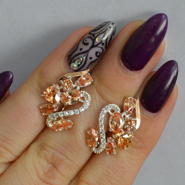 Срібні сережки з золотими пластинами