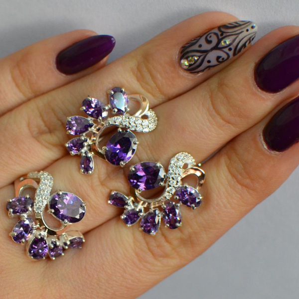 Срібний набір з золотими пластинами