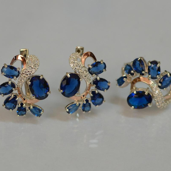 Срібний набір з золотими пластинами