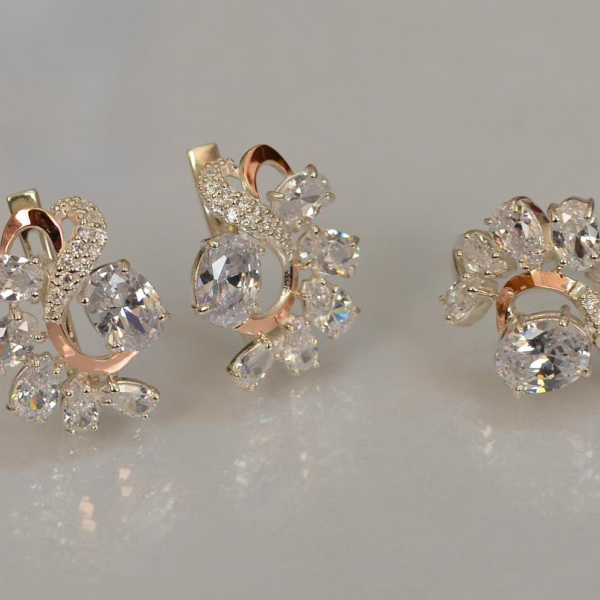 Срібний набір з золотими пластинами