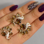 Срібний набір з золотими пластинами