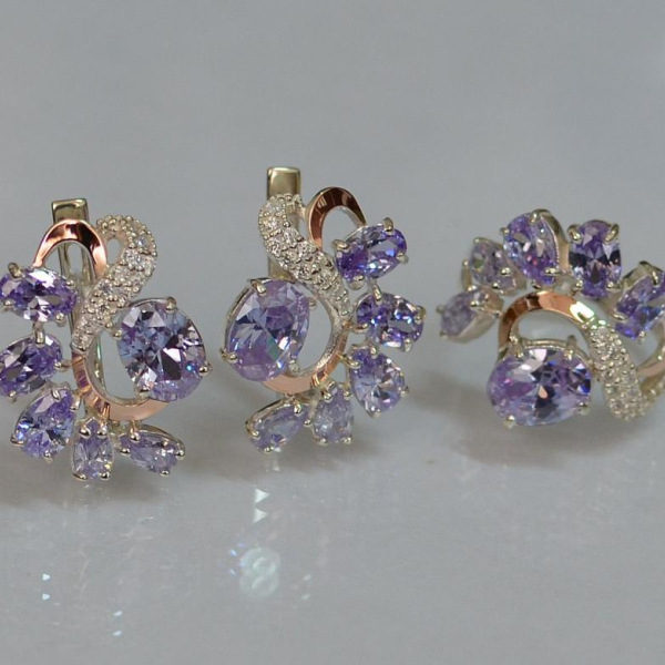 Срібний набір з золотими пластинами