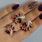 Срібний набір з золотими пластинами