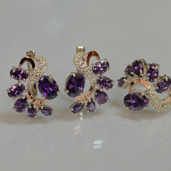 Срібний набір з золотими пластинами