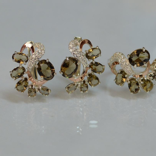 Срібний набір з золотими пластинами