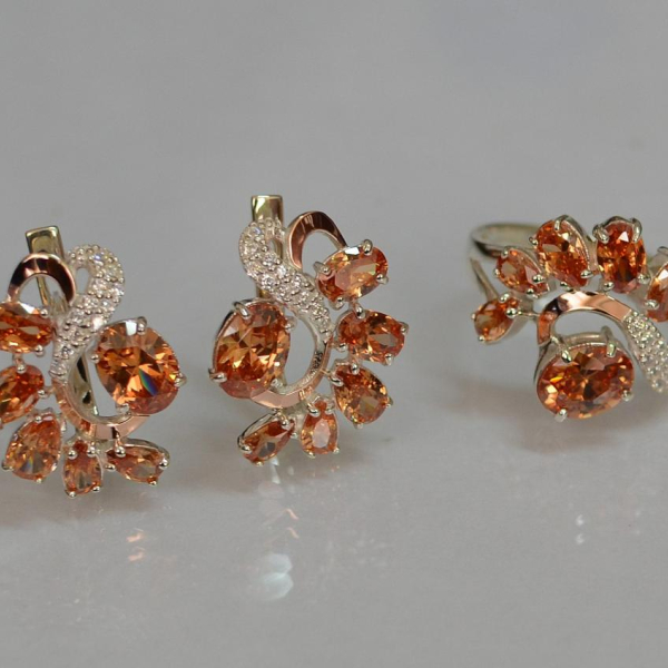 Срібний набір з золотими пластинами