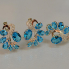 Срібний набір з золотими пластинами