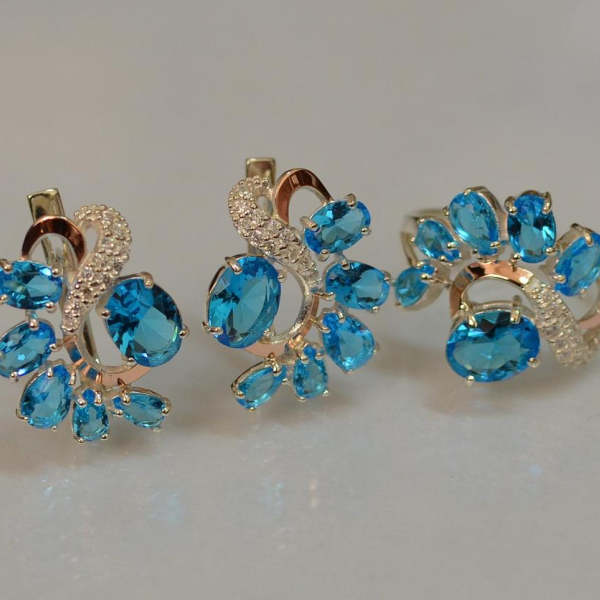 Срібний набір з золотими пластинами