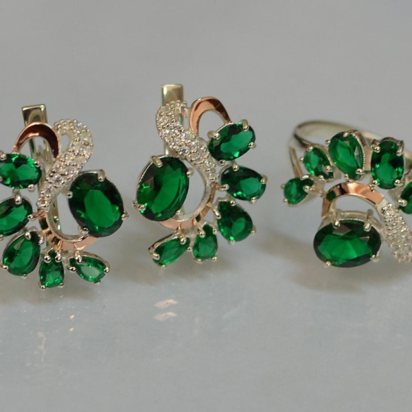 Срібний набір з золотими пластинами