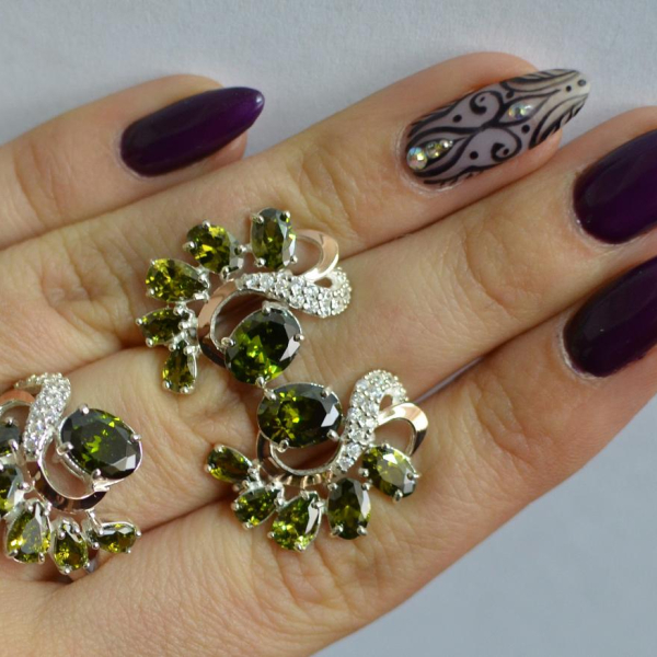 Срібний набір з золотими пластинами