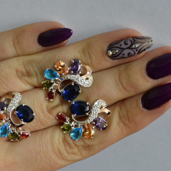 Срібний набір з золотими пластинами