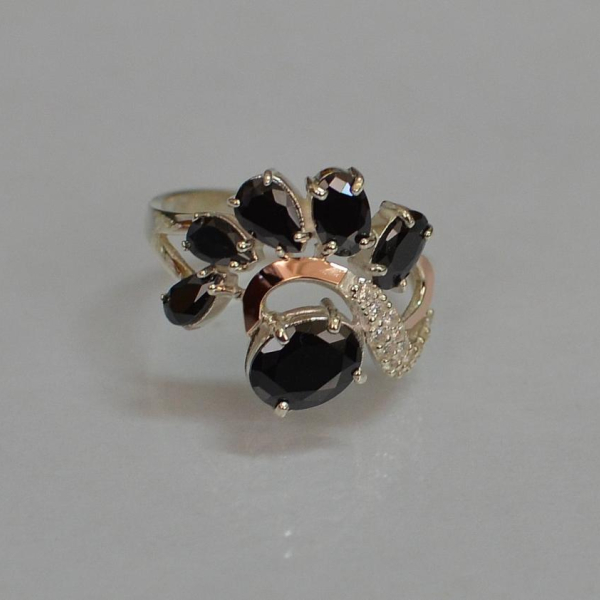 Срібна каблучка з золотими вставками