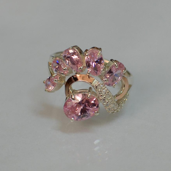 Срібна каблучка з золотими вставками