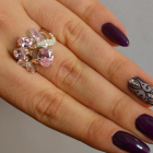 Срібна каблучка з золотими вставками