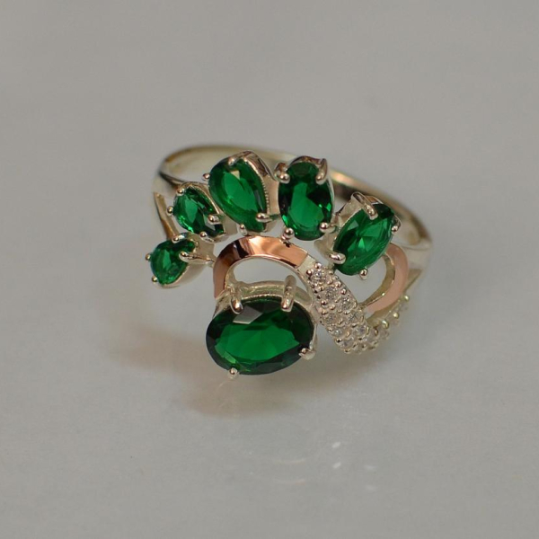 Срібна каблучка з золотими вставками