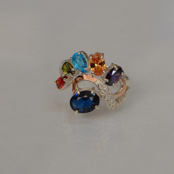 Срібна каблучка з золотими вставками