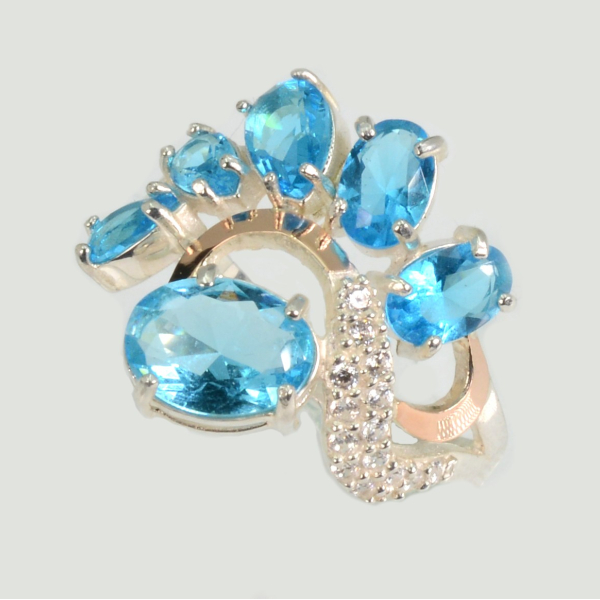 Срібна каблучка з золотими вставками