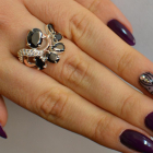 Срібна каблучка з золотими вставками