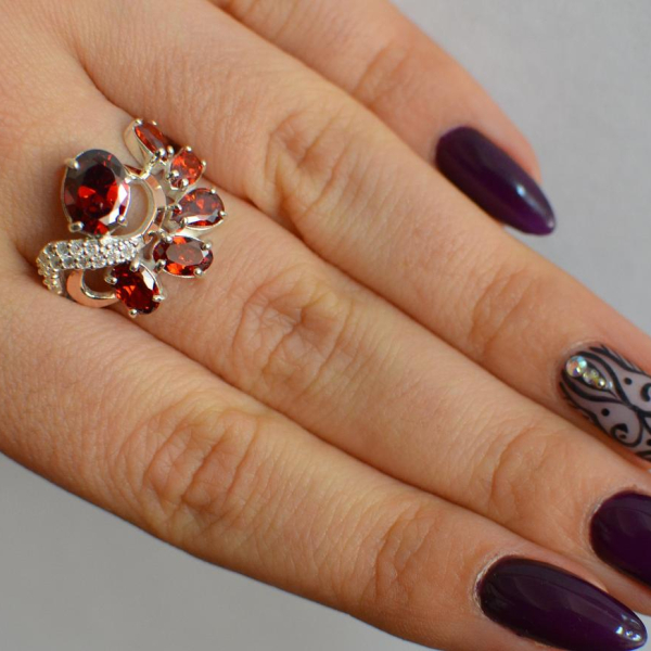 Срібна каблучка з золотими вставками