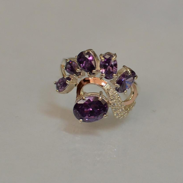 Срібна каблучка з золотими вставками