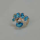 Срібна каблучка з золотими вставками