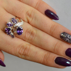 Срібна каблучка з золотими вставками