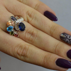 Срібна каблучка з золотими вставками