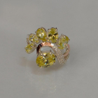 Срібна каблучка з золотими вставками