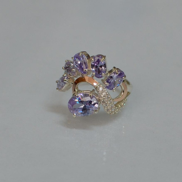 Срібна каблучка з золотими вставками