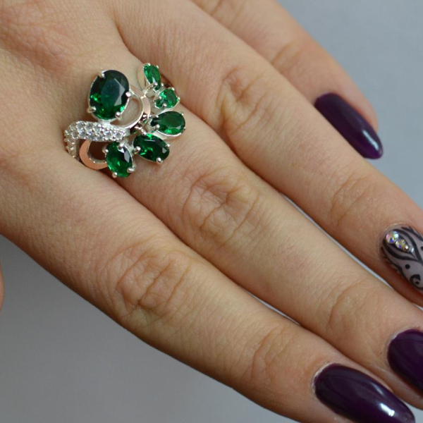 Срібна каблучка з золотими вставками