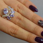 Срібна каблучка з золотими вставками