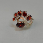 Срібна каблучка з золотими вставками